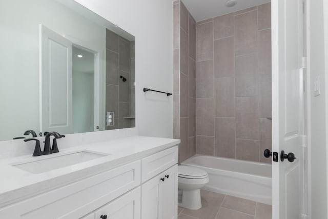 1411 E 34th St, Houston, TX 77022 - full bath with vanity, toilet, tile patterned flooring, and shower / tub combination