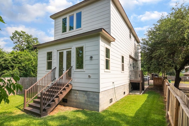 1411 E 34th St, Houston, TX 77022 - back of house with crawl space and french doors