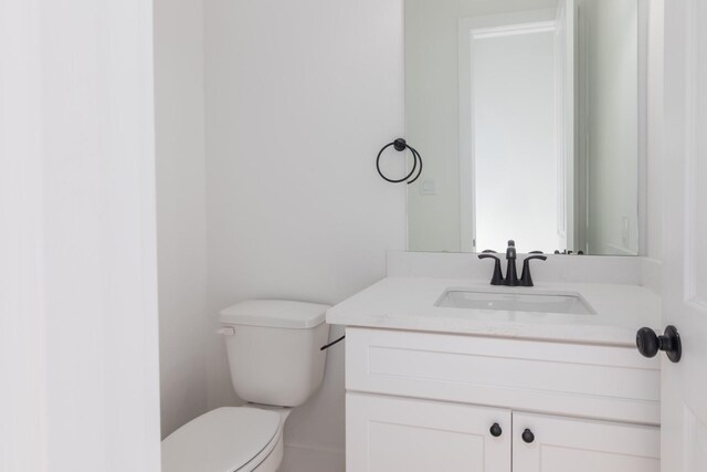 1411 E 34th St, Houston, TX 77022 - bathroom with toilet and vanity