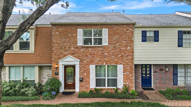 6417 Olympia Dr Unit 144, Houston, TX 77057 - view of property featuring brick siding