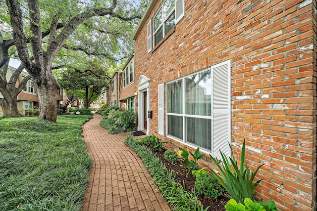 6417 Olympia Dr Unit 144, Houston, TX 77057 - view of home's exterior featuring brick siding