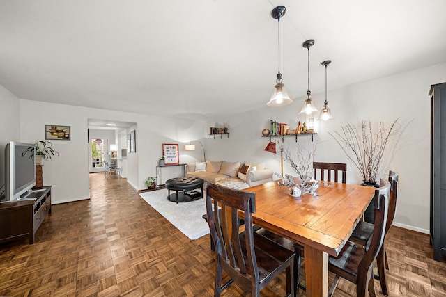 6417 Olympia Dr Unit 144, Houston, TX 77057 - dining room featuring baseboards