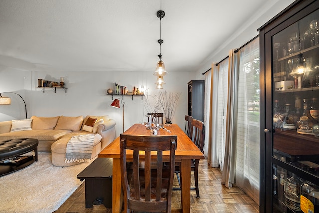6417 Olympia Dr Unit 144, Houston, TX 77057 - dining room featuring wine cooler