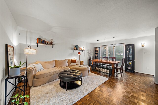 6417 Olympia Dr Unit 144, Houston, TX 77057 - living room with baseboards