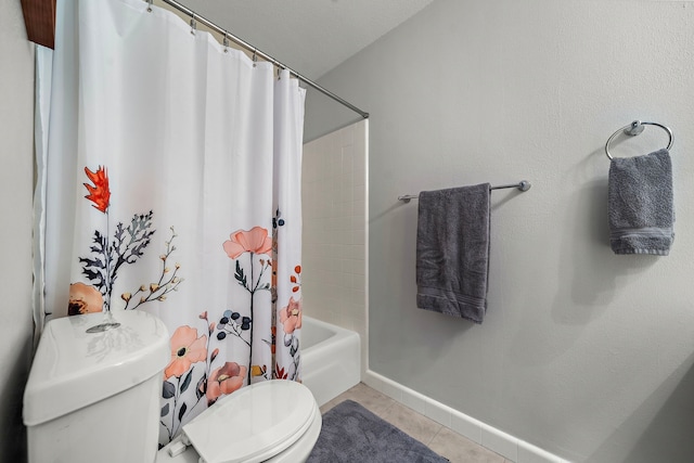 6417 Olympia Dr Unit 144, Houston, TX 77057 - bathroom with toilet, tile patterned flooring, and shower / bathtub combination with curtain