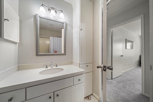 6417 Olympia Dr Unit 144, Houston, TX 77057 - bathroom featuring vanity and baseboards