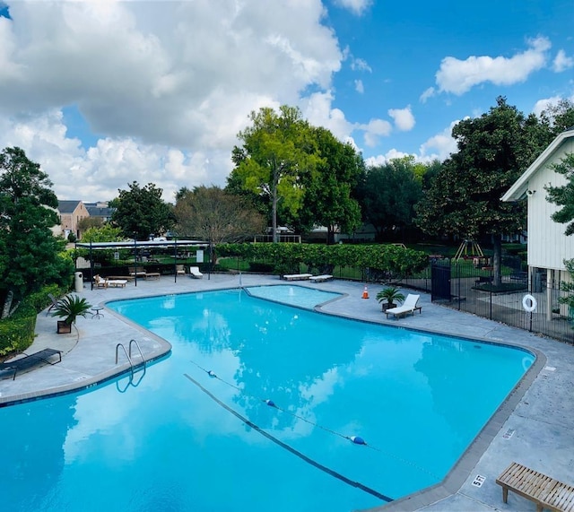6417 Olympia Dr Unit 144, Houston, TX 77057 - community pool featuring a patio
