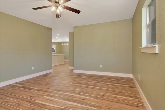 1105 W Dr, Port Neches, TX 77651 - spare room featuring a ceiling fan, light wood finished floors, baseboards, and recessed lighting