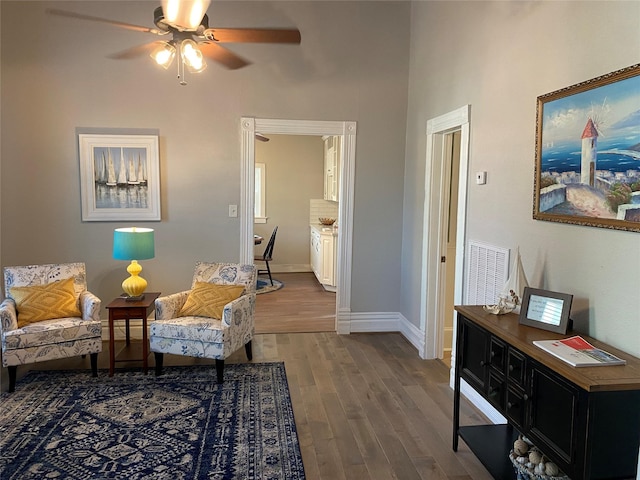1318 Bingham St, Houston, TX 77007 - sitting room featuring wood finished floors, ceiling fan, and baseboards