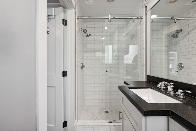 1409 Tulane St, Houston, TX 77008 - bathroom featuring a stall shower and vanity