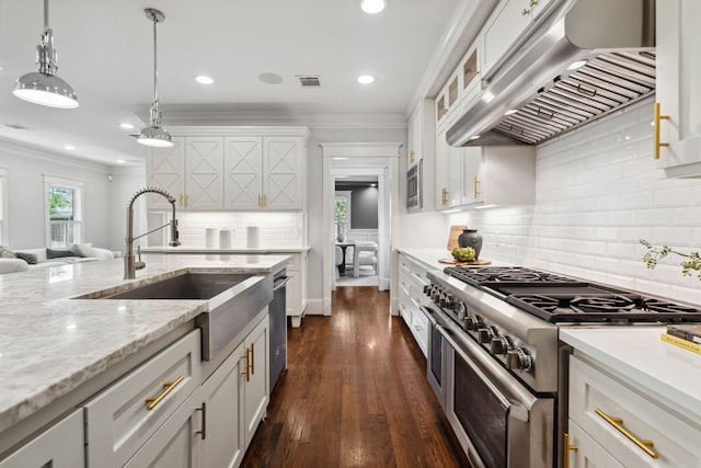 1409 Tulane St, Houston, TX 77008 - kitchen featuring stainless steel appliances, exhaust hood, a sink, white cabinets, and crown molding