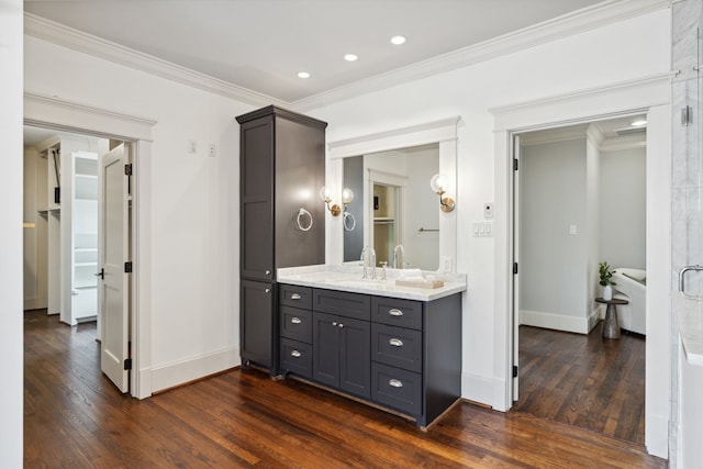 1409 Tulane St, Houston, TX 77008 - bathroom featuring wood finished floors, vanity, baseboards, crown molding, and recessed lighting
