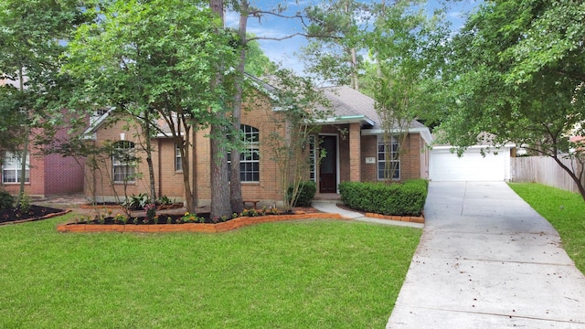 19 Long Springs Pl, The Woodlands, TX 77382 - obstructed view of property featuring brick siding, concrete driveway, and a garage