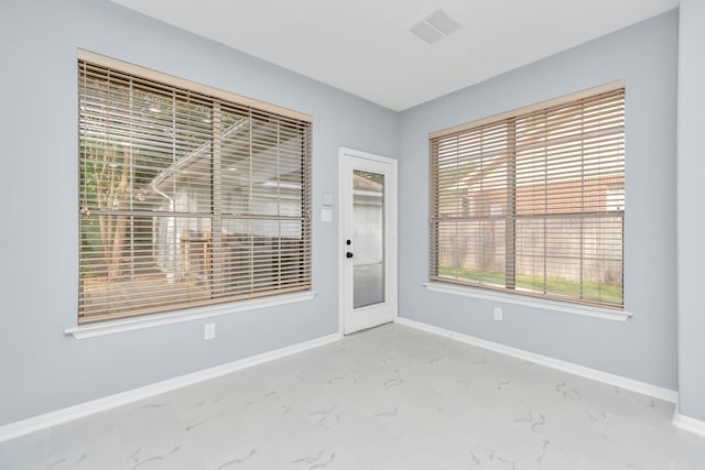 19 Long Springs Pl, The Woodlands, TX 77382 - empty room featuring baseboards and marble finish flooring