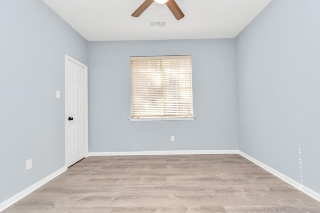 19 Long Springs Pl, The Woodlands, TX 77382 - spare room with ceiling fan, wood finished floors, and baseboards