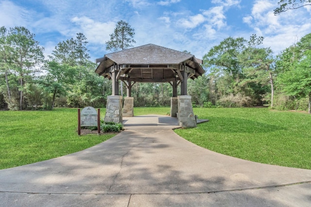 19 Long Springs Pl, The Woodlands, TX 77382 - surrounding community with a gazebo, a lawn, and concrete driveway