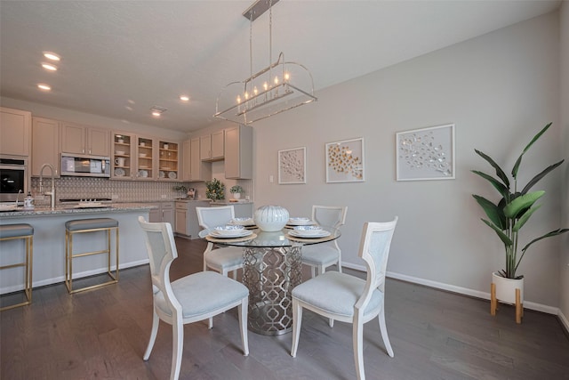 2923 Laurel Mill Way, Houston, TX 77080 - dining area with a chandelier, recessed lighting, baseboards, and dark wood-type flooring
