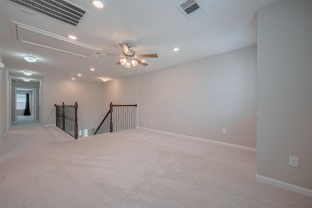 2923 Laurel Mill Way, Houston, TX 77080 - empty room with attic access, light colored carpet, recessed lighting, baseboards, and a ceiling fan