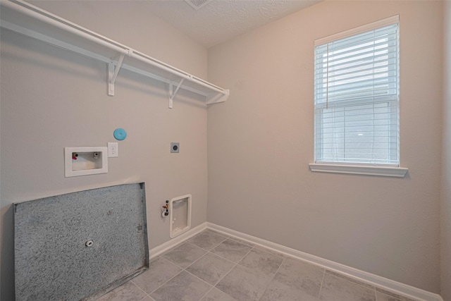 2923 Laurel Mill Way, Houston, TX 77080 - washroom with hookup for a gas dryer, hookup for an electric dryer, washer hookup, baseboards, and tile patterned flooring