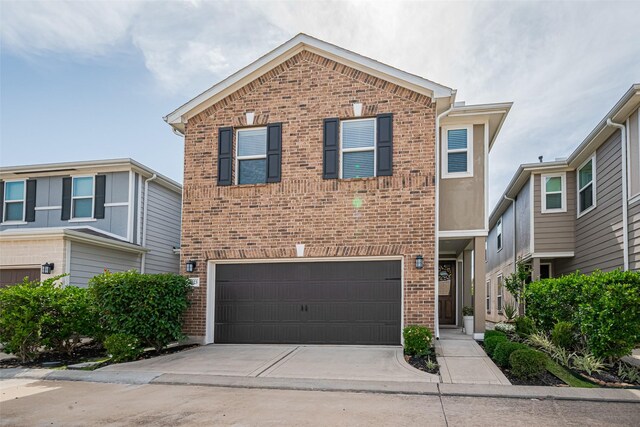 2923 Laurel Mill Way, Houston, TX 77080 - traditional-style home with brick siding, an attached garage, and driveway