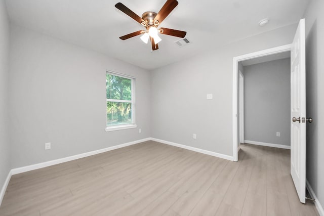 3030 Dacca Dr, Houston, TX 77051 - unfurnished room with a ceiling fan, light wood-style floors, and baseboards