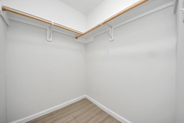 3030 Dacca Dr, Houston, TX 77051 - walk in closet featuring light wood-style floors