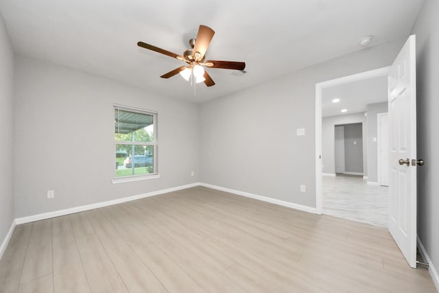 3030 Dacca Dr, Houston, TX 77051 - unfurnished room featuring ceiling fan, light wood-type flooring, baseboards, recessed lighting, and a smoke detector