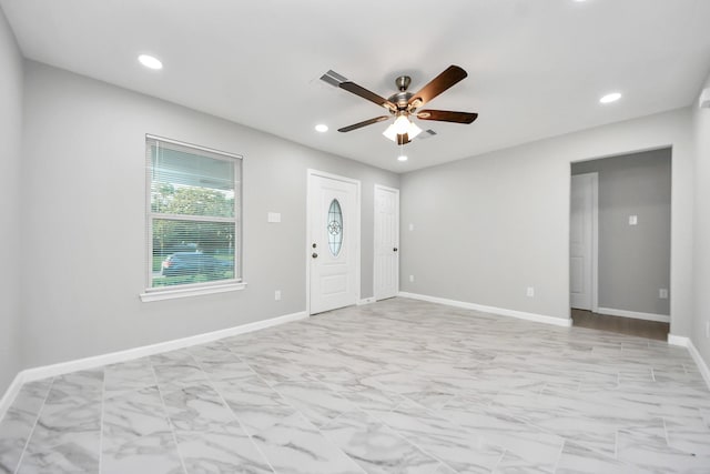 3030 Dacca Dr, Houston, TX 77051 - entrance foyer featuring ceiling fan, light marble finish flooring, recessed lighting, and baseboards