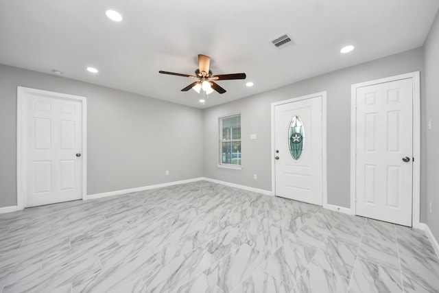 3030 Dacca Dr, Houston, TX 77051 - foyer entrance with ceiling fan, recessed lighting, light marble finish floors, and baseboards