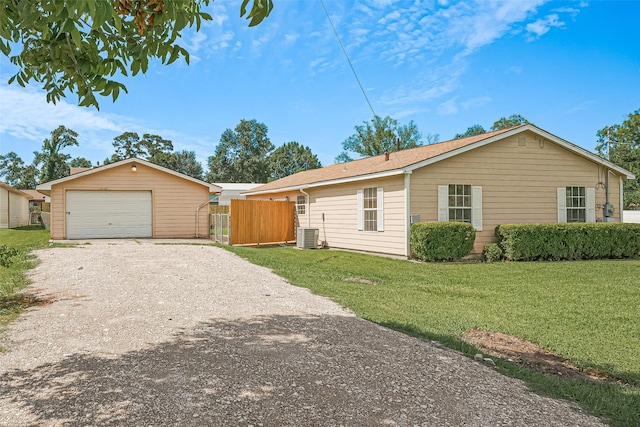 115 N 12th St, Highlands, TX 77562 - view of front facade featuring gravel driveway, a garage, and central AC