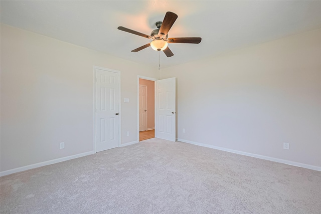 115 N 12th St, Highlands, TX 77562 - unfurnished room with ceiling fan, light carpet, and baseboards