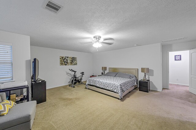 28614 Cabrera Hill Ln, Katy, TX 77494 - bedroom with light carpet, baseboards, a textured ceiling, and a ceiling fan
