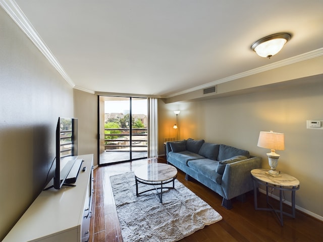 3525 Sage Rd Unit 412, Houston, TX 77056 - living room with crown molding, wood finished floors, a wall of windows, and baseboards