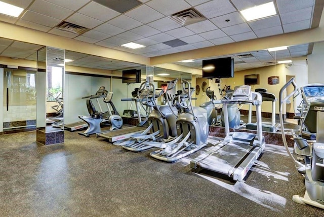 3525 Sage Rd Unit 403, Houston, TX 77056 - exercise room with a paneled ceiling