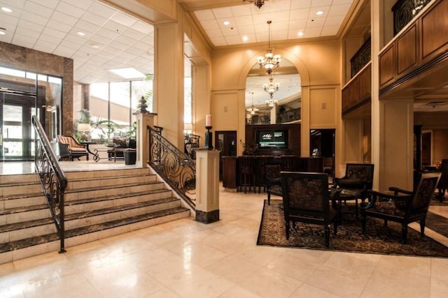 3525 Sage Rd Unit 403, Houston, TX 77056 - building lobby with stairway, recessed lighting, and crown molding