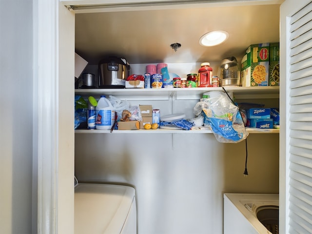 3525 Sage Rd Unit 403, Houston, TX 77056 - pantry featuring separate washer and dryer