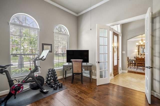 4611 Kings Landing Ln, Katy, TX 77494 - workout area featuring french doors, ornamental molding, a chandelier, wood finished floors, and baseboards