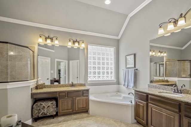 4611 Kings Landing Ln, Katy, TX 77494 - full bath featuring lofted ceiling, a garden tub, two vanities, a stall shower, and crown molding