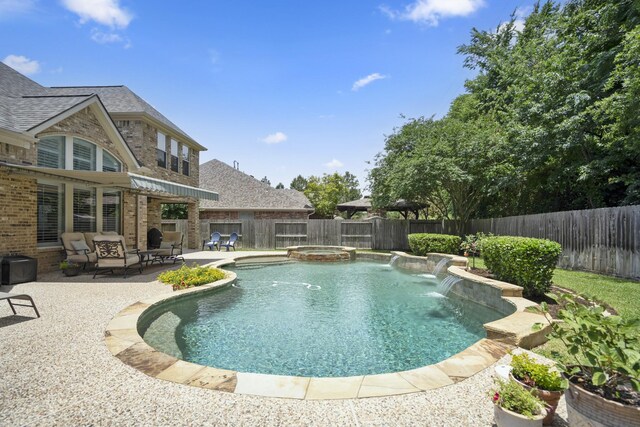 4611 Kings Landing Ln, Katy, TX 77494 - view of swimming pool with a fenced backyard, a patio, and a pool with connected hot tub