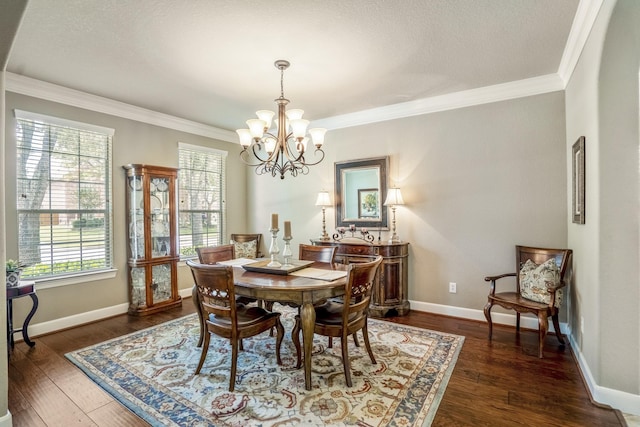4611 Kings Landing Ln, Katy, TX 77494 - dining room with a chandelier, ornamental molding, dark wood-type flooring, and baseboards