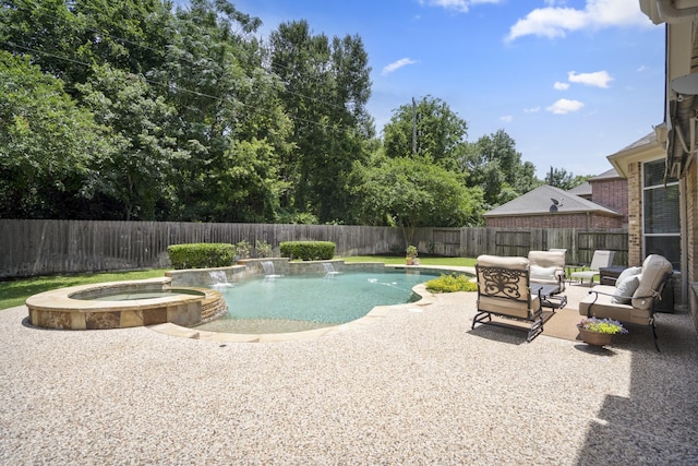 4611 Kings Landing Ln, Katy, TX 77494 - view of swimming pool with a patio, a fenced backyard, a pool with connected hot tub, and an outdoor hangout area