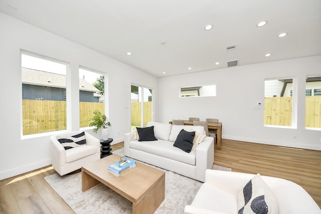 4602 Bristol St, Houston, TX 77009 - living room with light wood-style floors, recessed lighting, and baseboards