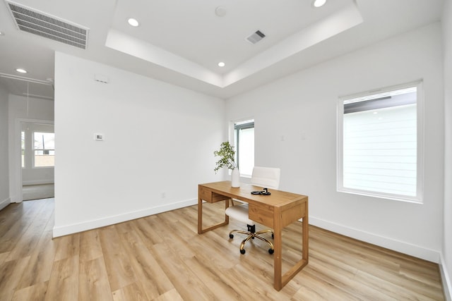 4602 Bristol St, Houston, TX 77009 - office space with attic access, light wood-type flooring, a tray ceiling, baseboards, and recessed lighting