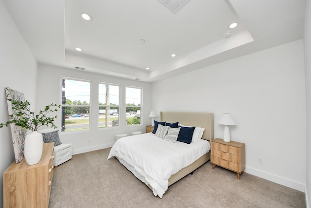 4602 Bristol St, Houston, TX 77009 - bedroom with recessed lighting, light colored carpet, baseboards, and a raised ceiling