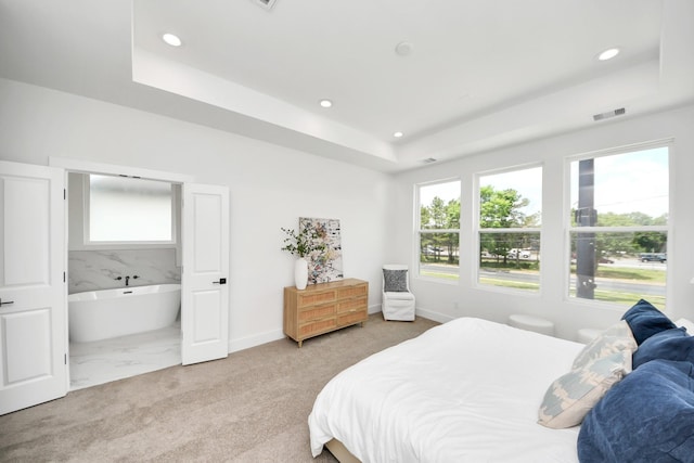4602 Bristol St, Houston, TX 77009 - carpeted bedroom with a raised ceiling, recessed lighting, and baseboards