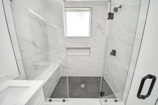 4602 Bristol St, Houston, TX 77009 - full bath with a marble finish shower and vanity