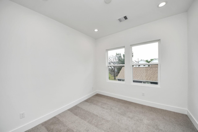 4602 Bristol St, Houston, TX 77009 - empty room featuring baseboards, carpet flooring, and recessed lighting