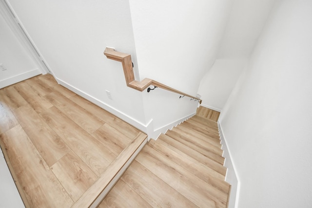 103 Frawley St, Houston, TX 77009 - stairs featuring wood finished floors and baseboards