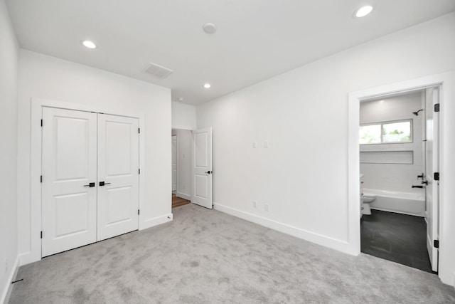 103 Frawley St, Houston, TX 77009 - unfurnished bedroom featuring carpet floors, recessed lighting, baseboards, a closet, and ensuite bathroom