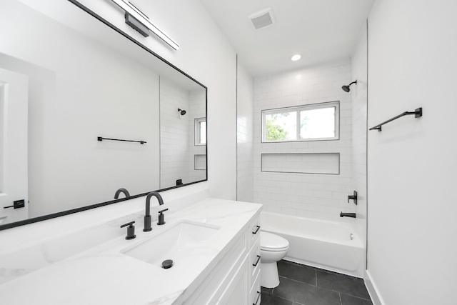 103 Frawley St, Houston, TX 77009 - full bathroom with tile patterned flooring, vanity, toilet, shower / bath combination, and recessed lighting